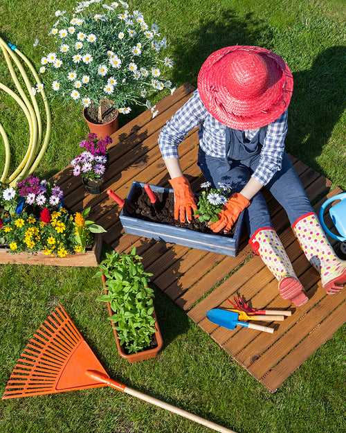 Gardener outside in the sun.